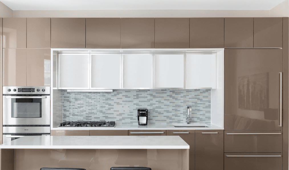 Five kitchens with integrated appliances that make a space seem larger and less cluttered