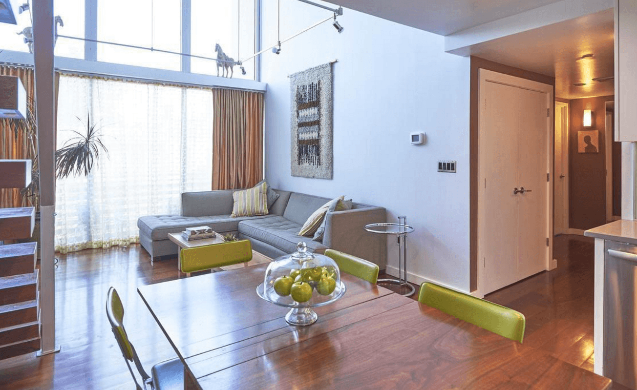 Loft style and lots of light in this two-bedroom "Glass House" condo