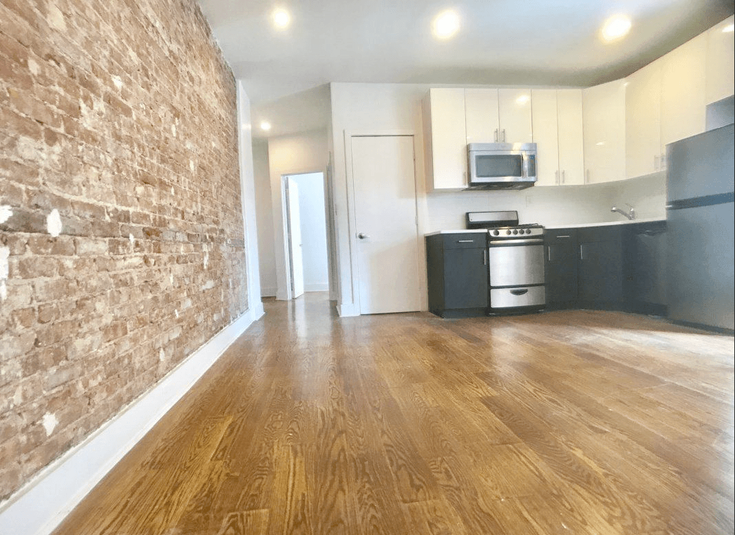 Three roommates can share this Harlem apartment for $1,000 each—if they can handle a fourth floor walk-up