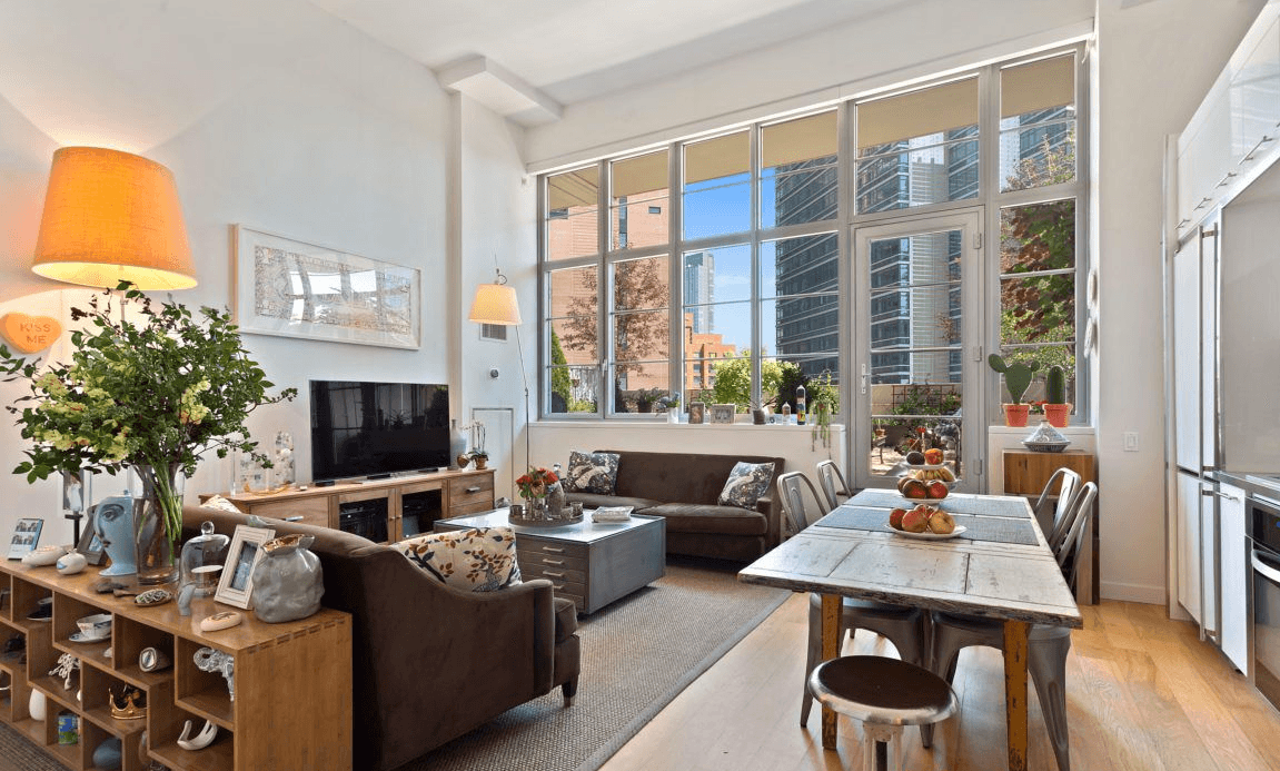 Soaring ceilings, an expansive terrace, and city views in this LIC condo 