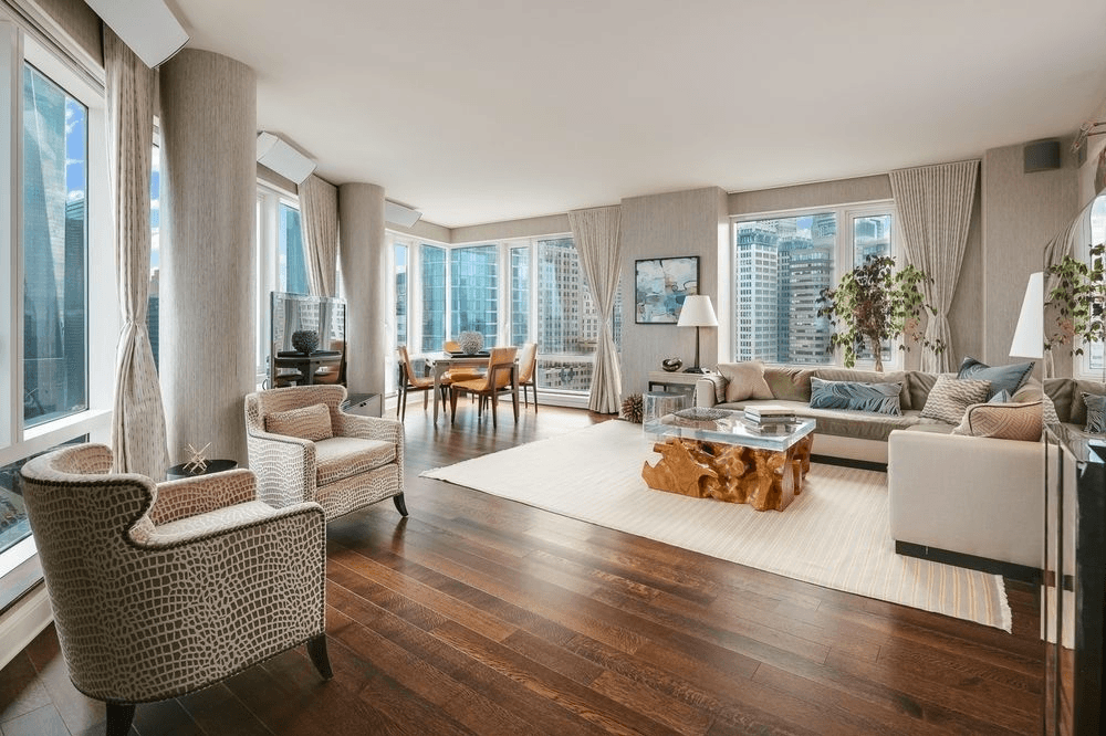 Take flight in this sprawling, eco-forward condo with soaring, floor-to-ceiling views of New York Harbor and downtown Manhattan