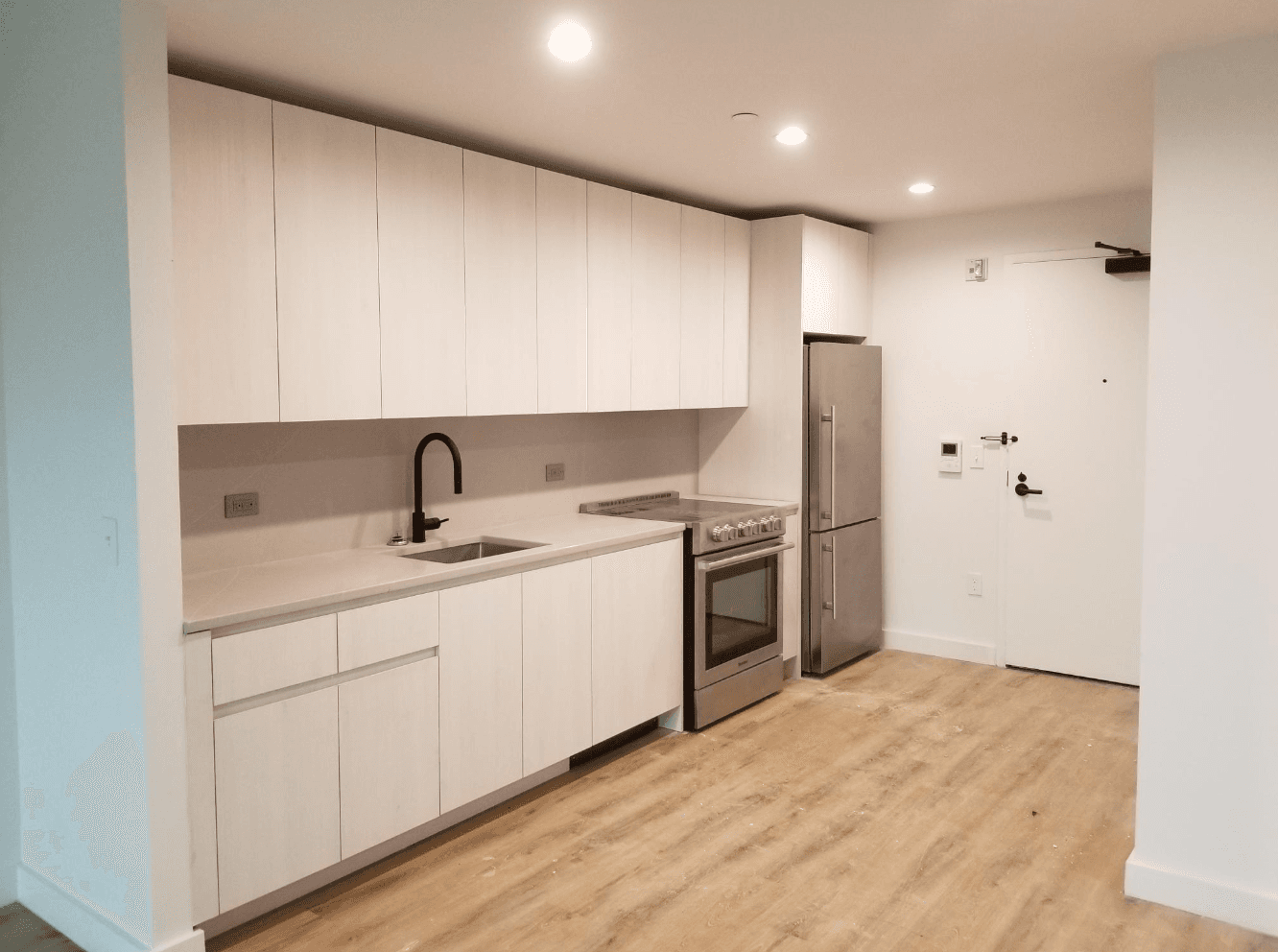 interior galley kitchen of apartment building in Queens