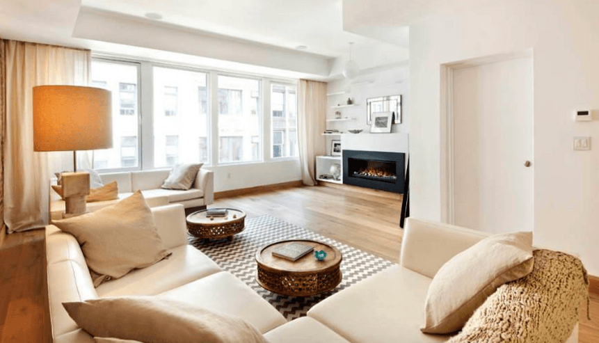 Cozy up in front of the fireplace in this luxe Gramercy rental