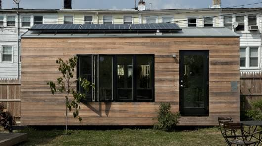 One CUNY professor has an adorable, eco-friendly house, just needs a place to park it