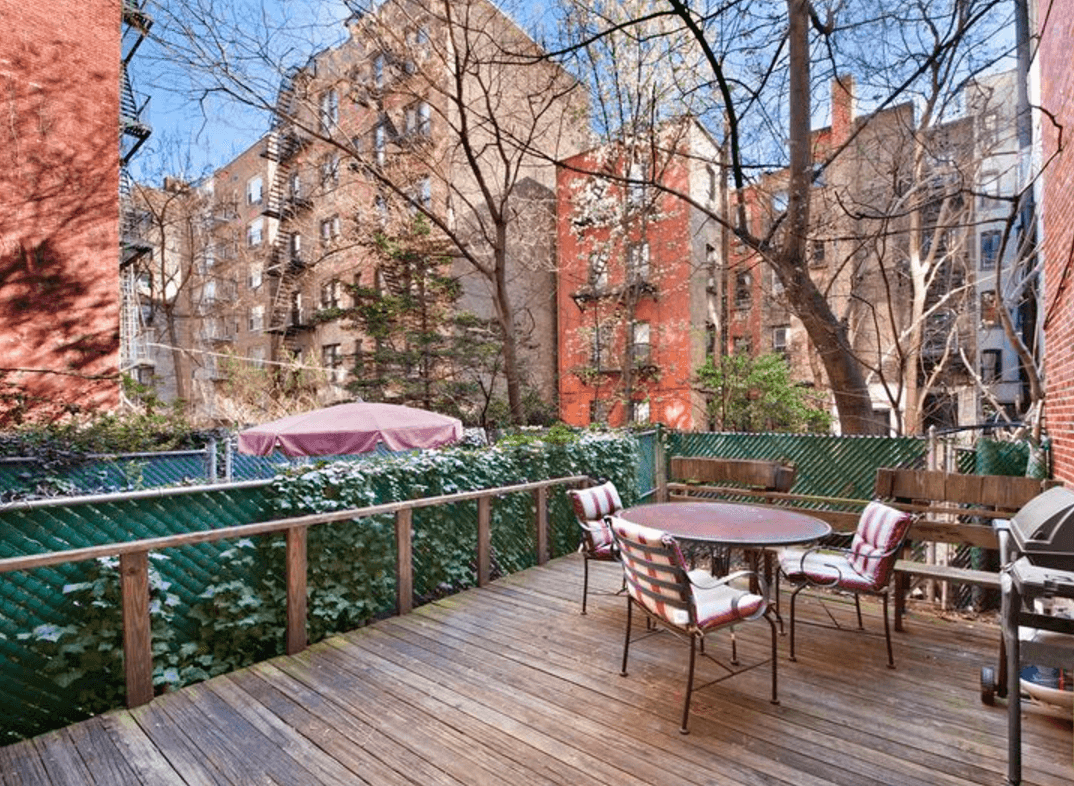 Squeezing into a studio may be worth it when it comes with a backyard like this one