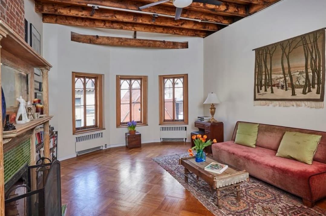 You'll save money if you buy the top-floor apartment in a walk-up, but does it make sense?