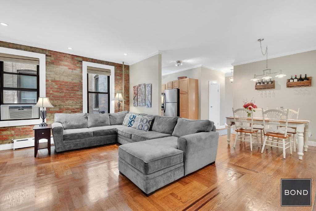 An Astoria co-op with lots of exposed brick