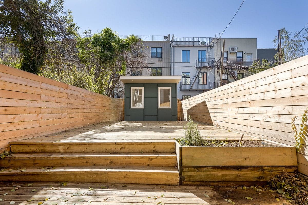 What are the rules for building a storage shed or home office in a NYC backyard?