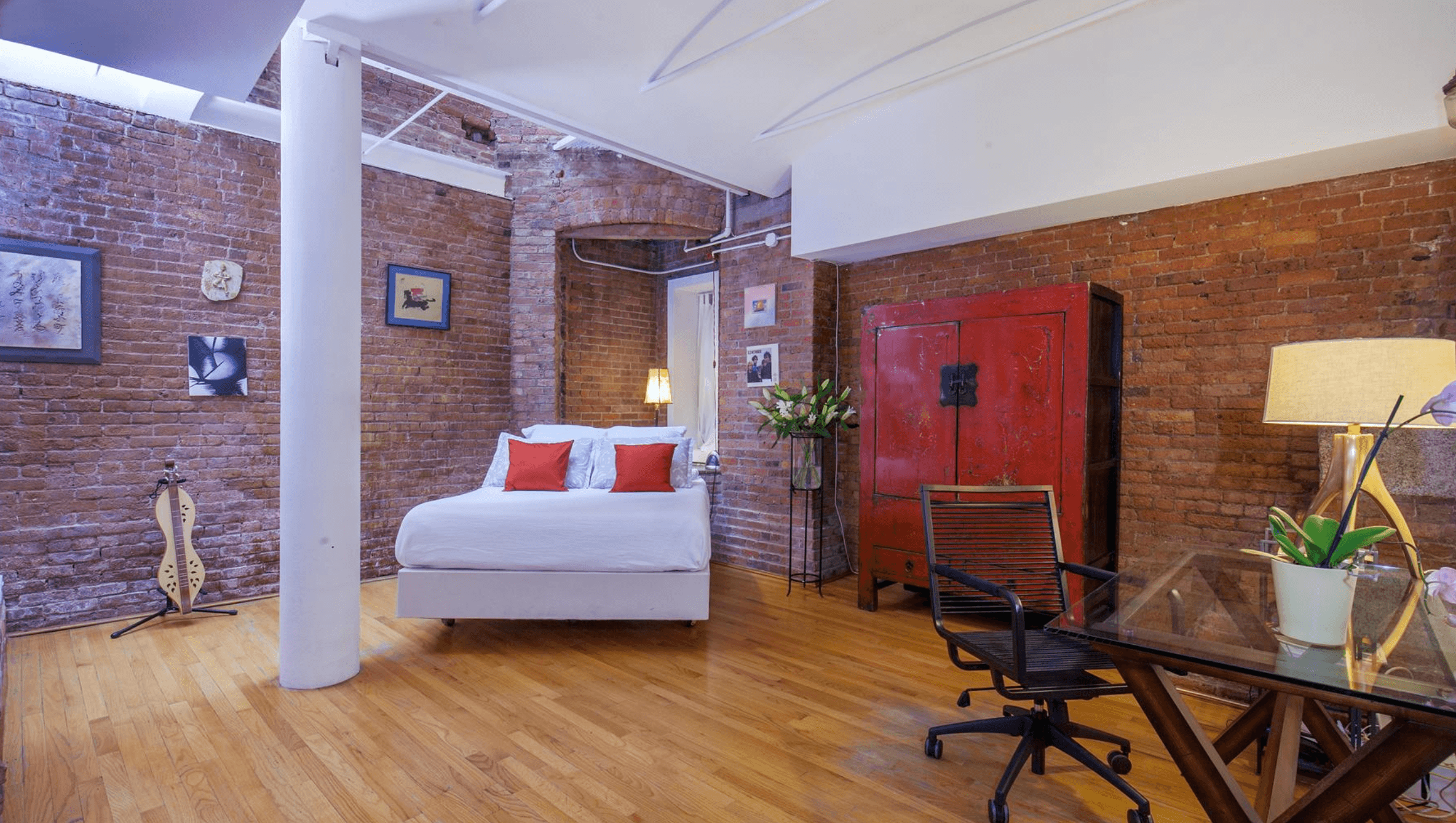 What's best about this Tribeca loft: the gorgeous layout, the exposed brick, or the extra bathroom?