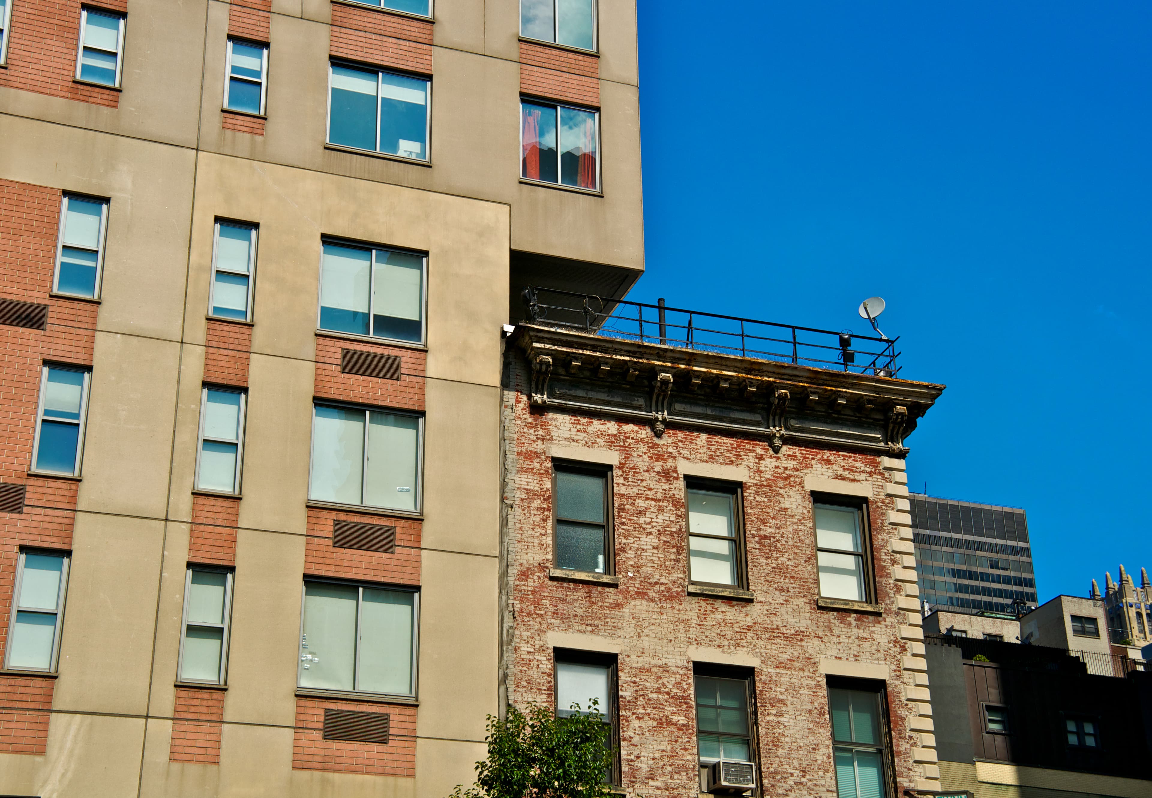   Which type of non-doorman building is safer in NYC, a walk-up or one with an elevator?  