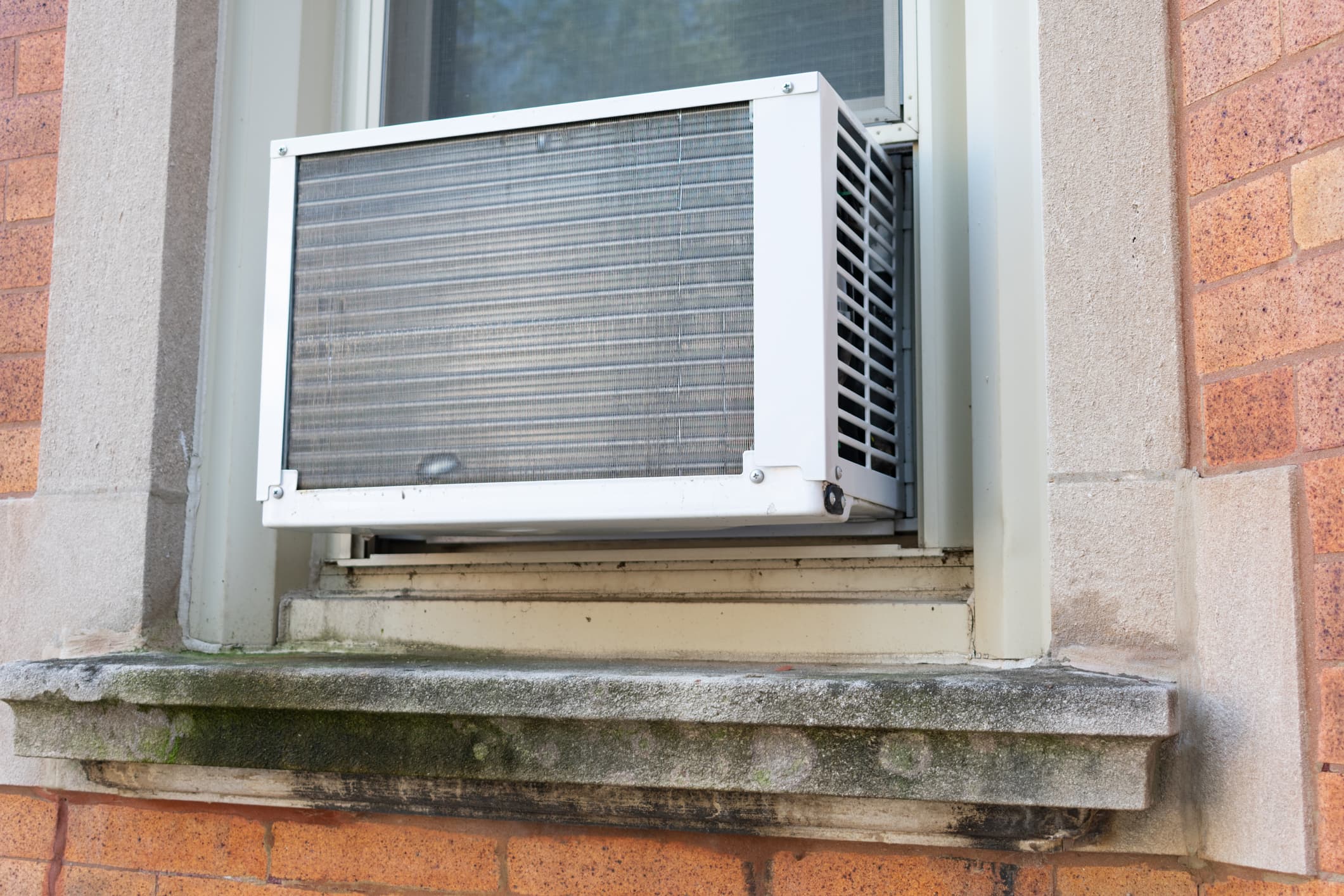 My neighbor's AC looks unsafe. What are the rules for installing a window air conditioner in NYC?