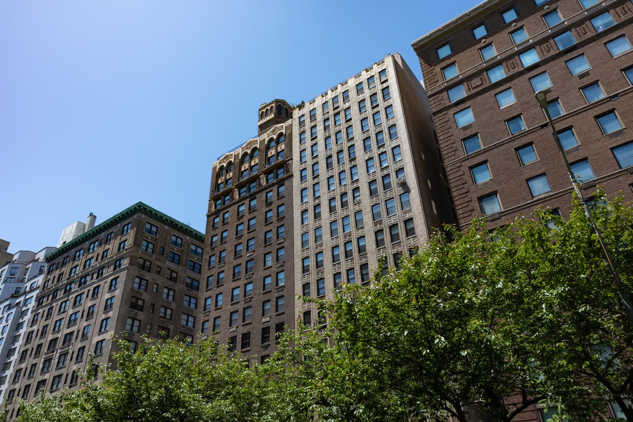 What are the advantages of using an LLC to buy a condo in NYC?