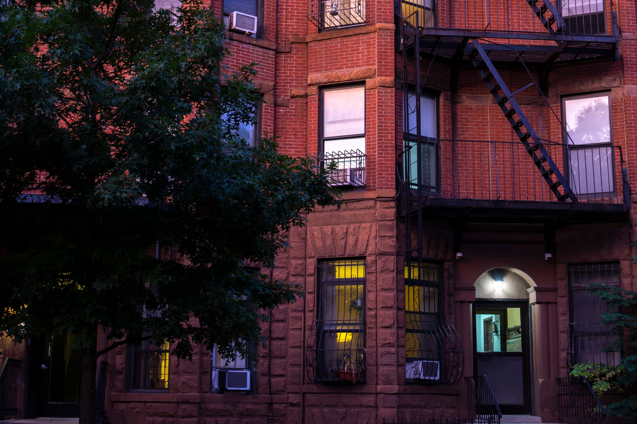 Red brick apartment building in Park Slope in the evening