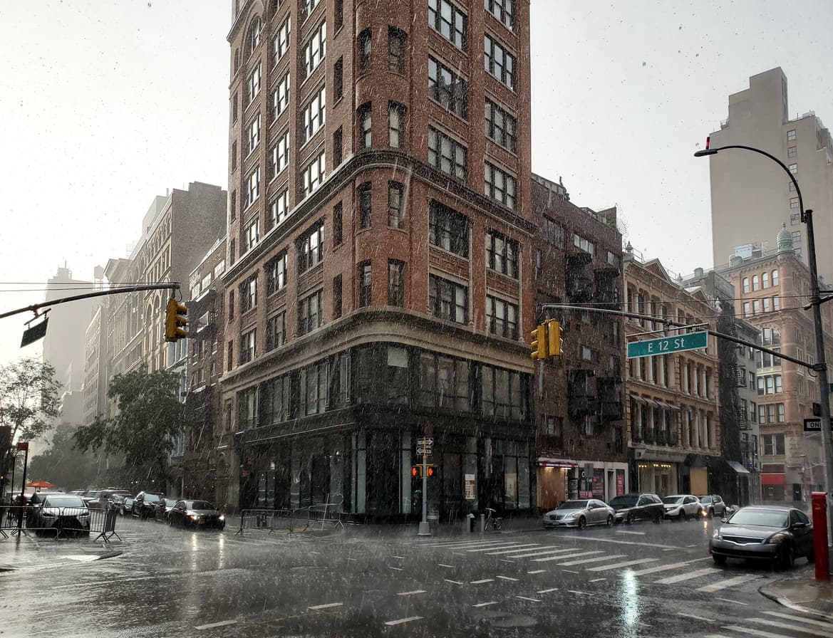 Rain on the intersection of Broadway and 12th Street in New York City