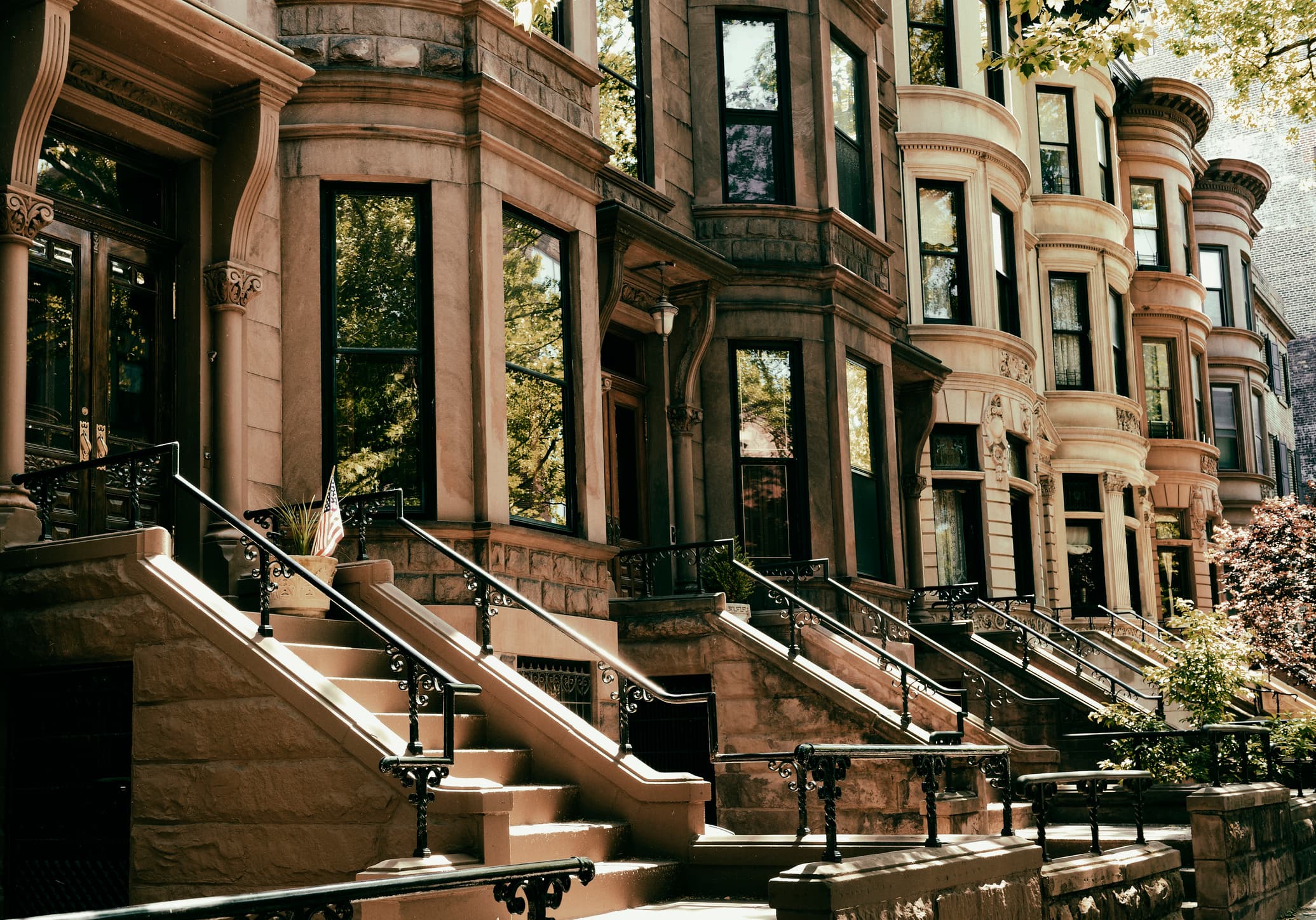 Row of brownstones in Park Slope Brooklyn on an autumn morning. NYC.
