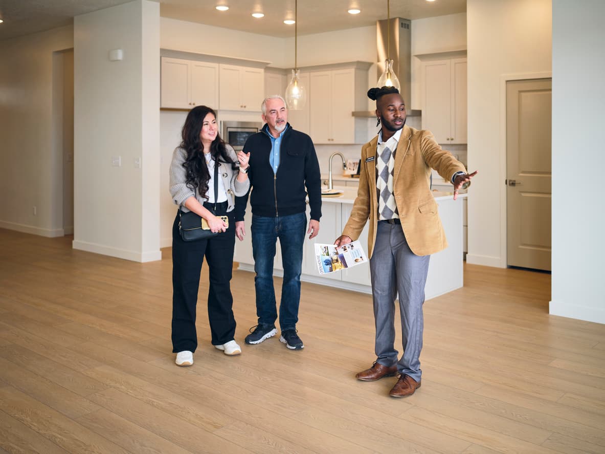 Agent showing a property to prospective buyers