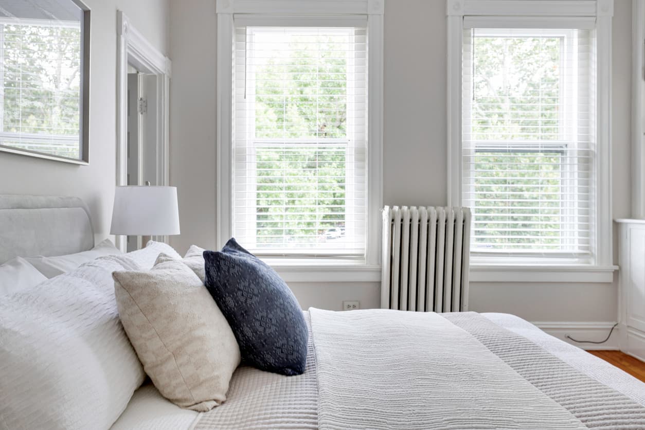 Bedroom with cast iron radiator