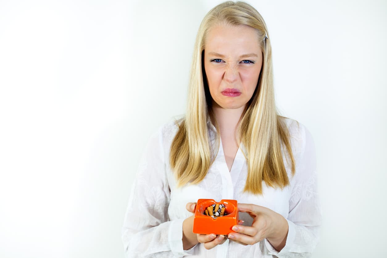 Dear Ms. Demeanor: My building has cigarette butts everywhere. It's disgusting. What can I do?