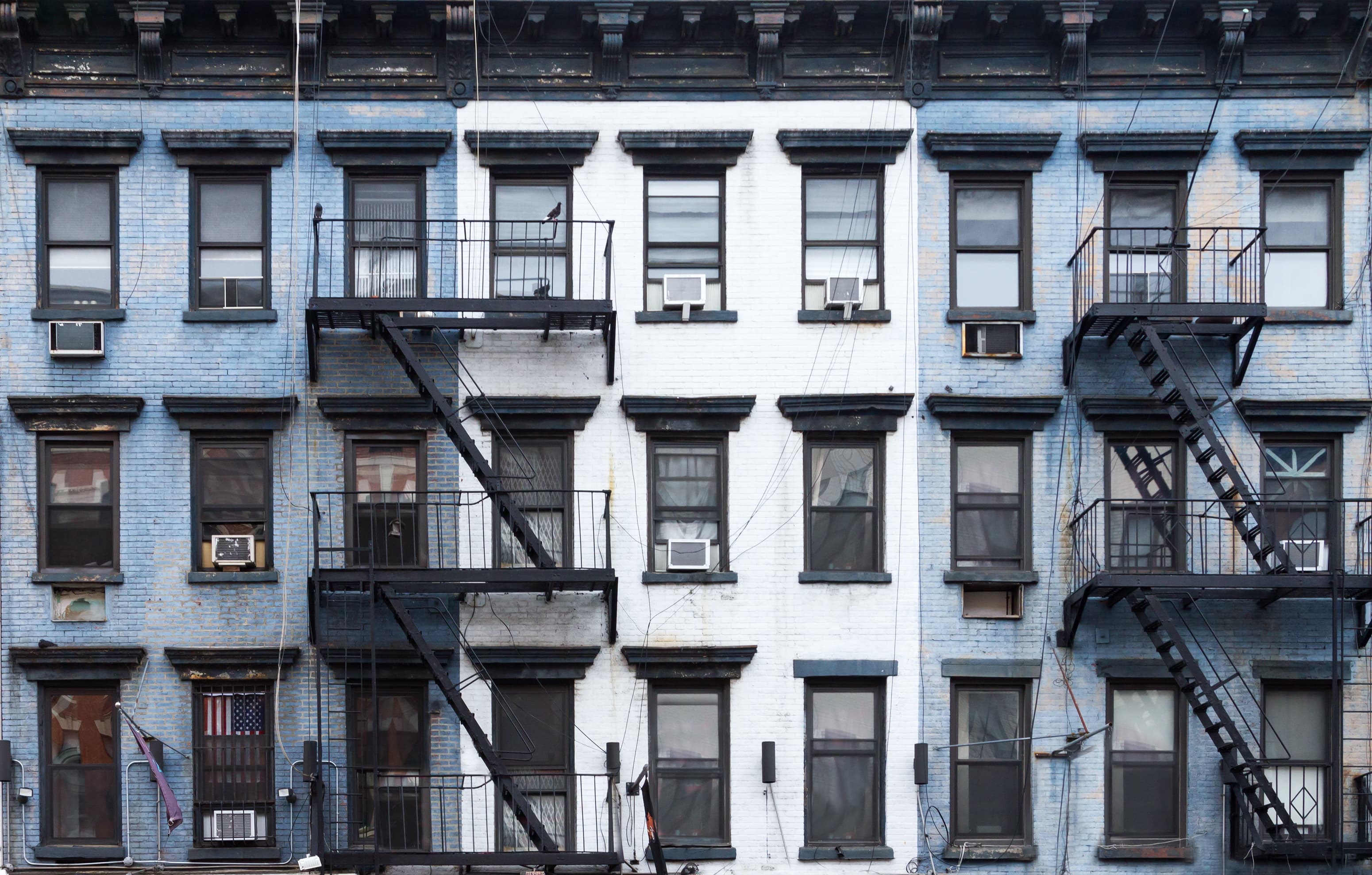 NYC Blue and white brick apartment buildings in the East Village of Manhattan in New York City