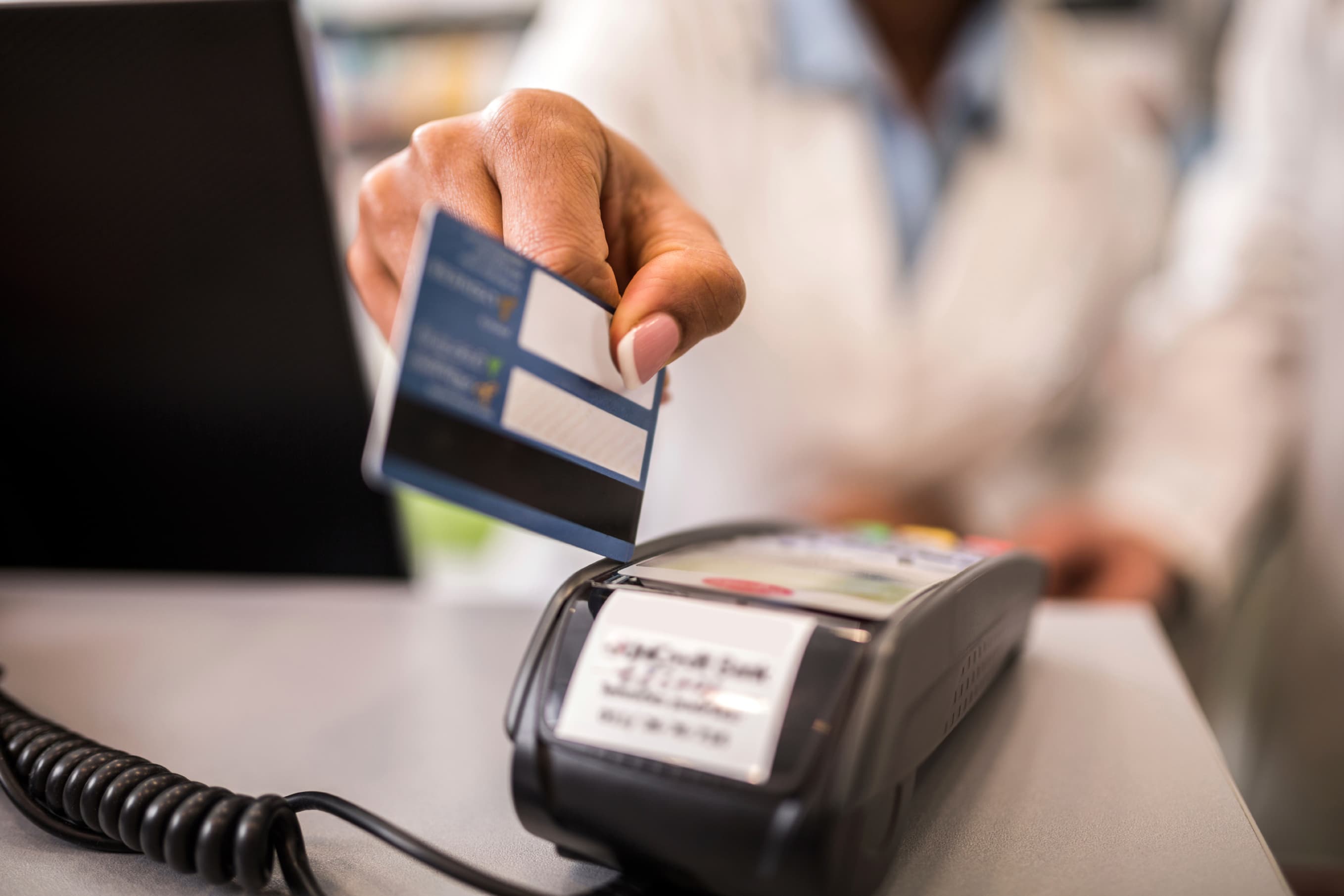 Pay common charges with plastic and you'll rack up miles—for a fee