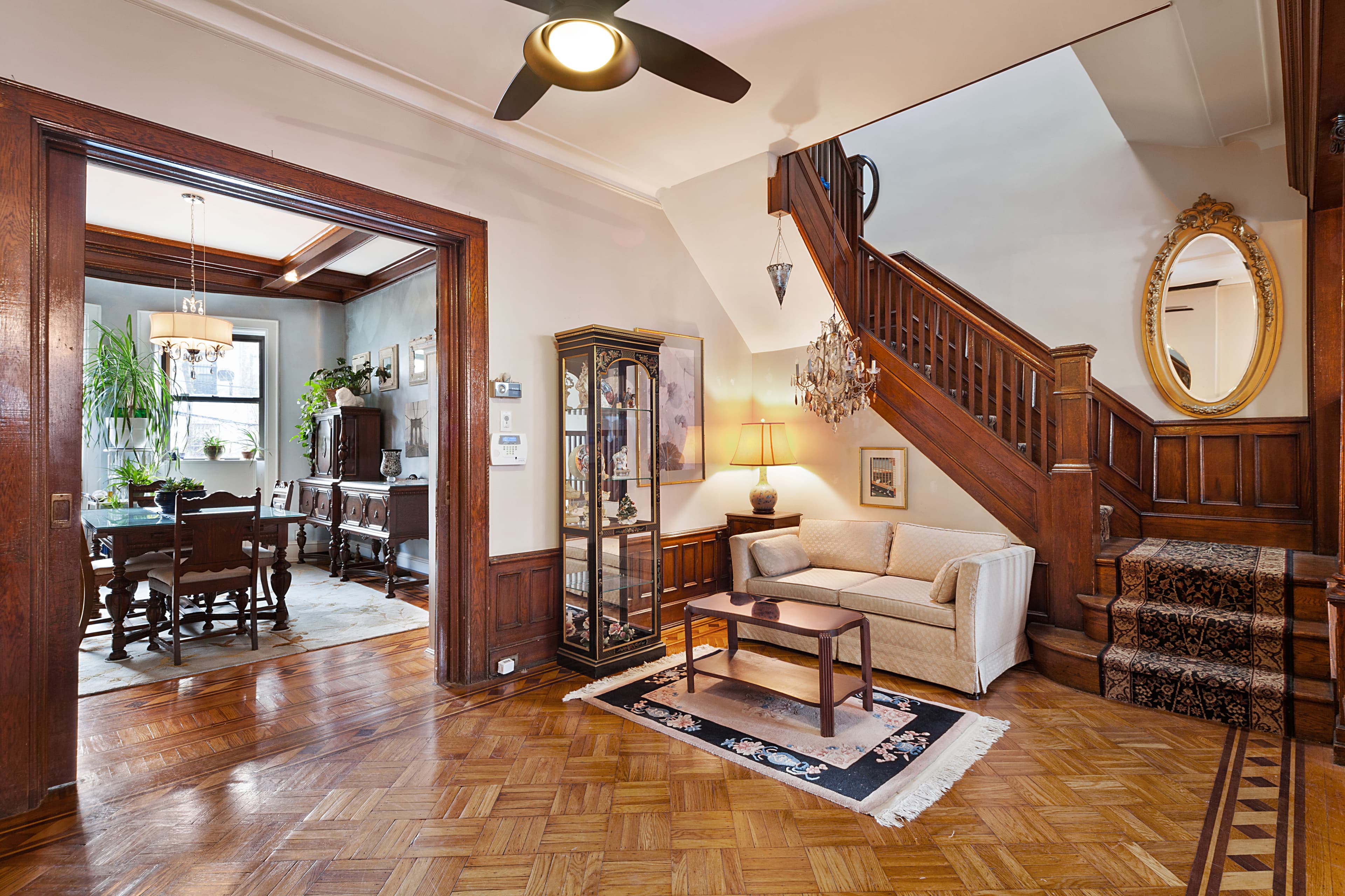 This limestone Bay Ridge townhouse is a symphony of oak floors, stained glass, and other historic details