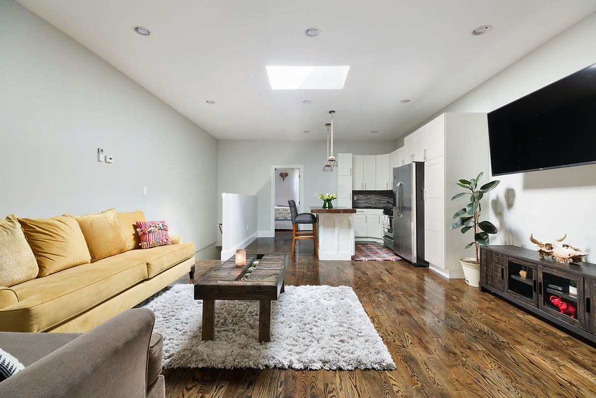 This renovated townhouse in Bedford-Stuyvesant comes with a backyard and a rental unit