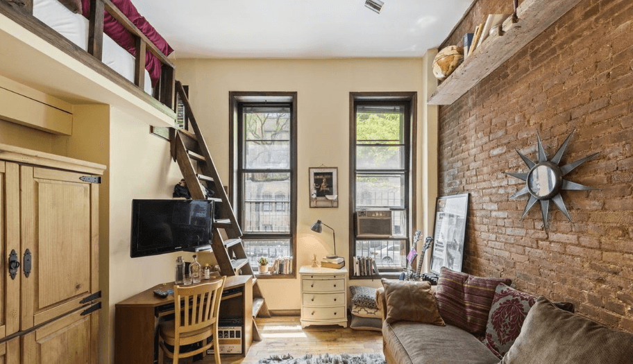 This Upper West Side studio uses a loft bed to make extra space for entertaining