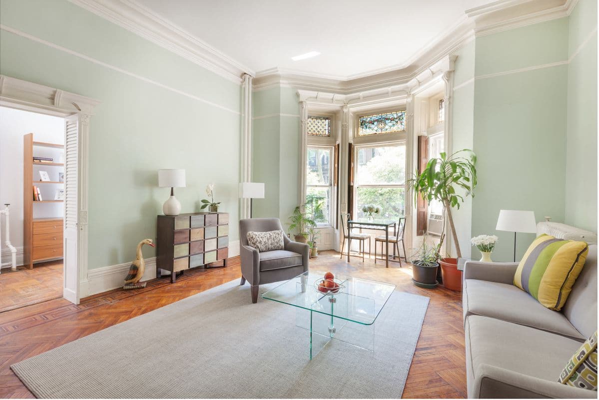 This sweet Park Slope one bedroom has a cherry red kitchen 