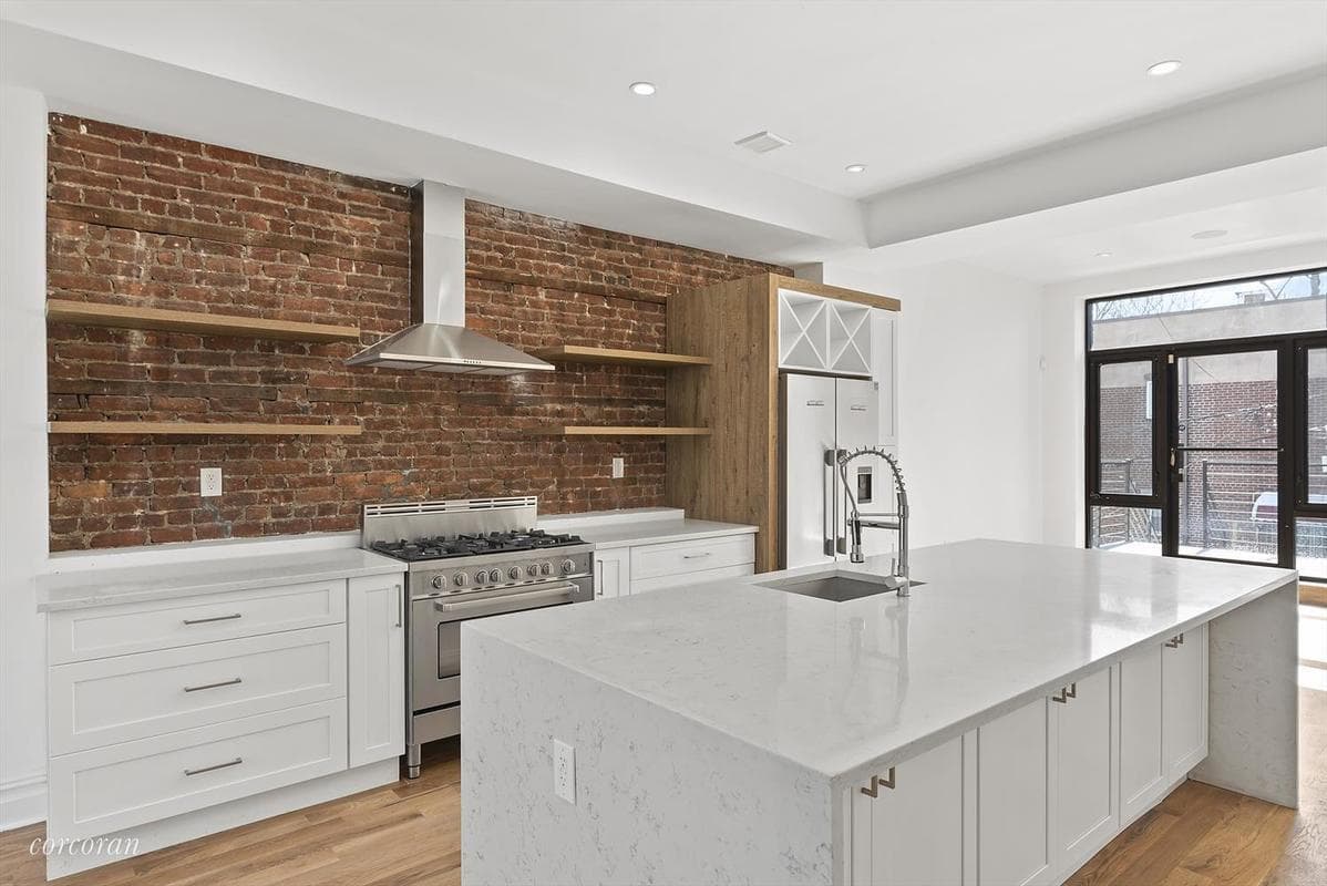 A renovated two family in Brooklyn near trains (and a car body shop)