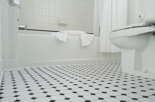 NYC Renovation Qs: Should I junk my bathroom tiles or tile over the old ones?