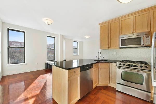 Calling Columbia students: A Hamilton Heights four-bedroom with roommate-friendly flourishes